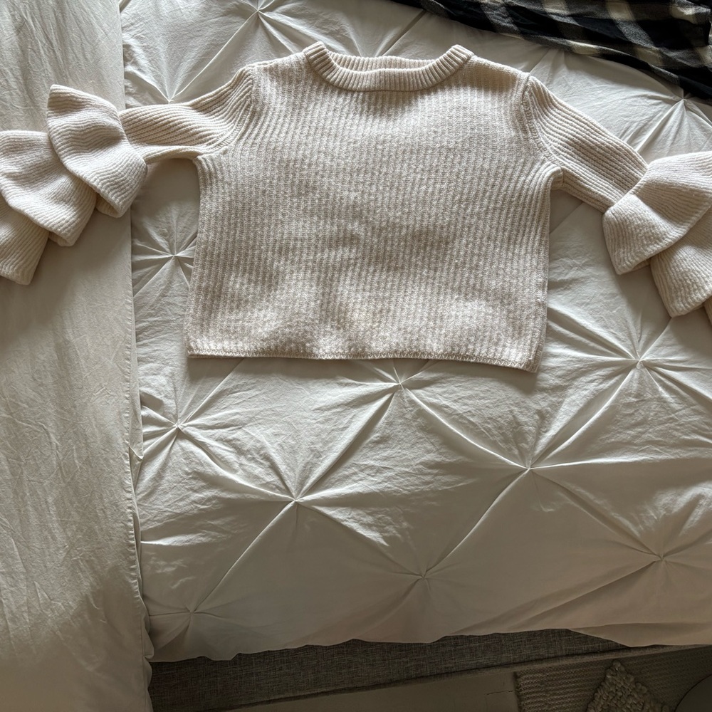 Elegant Cream Sweater with Ruffled Sleeves